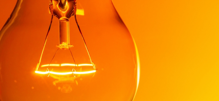 Ethical versus impact investing blog image of lightbulb