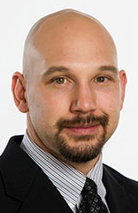 Photo of Craig Adams.